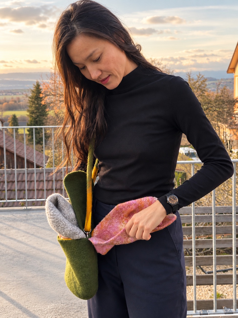 Saikal with a felt bag at golden hour